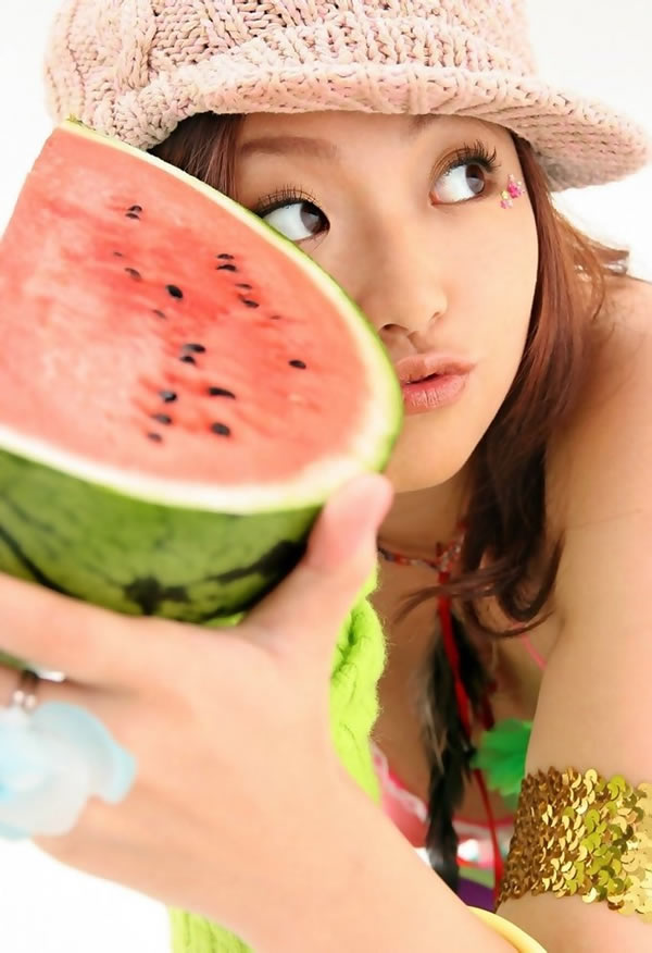 Japanese Cutie posing with a watermelon