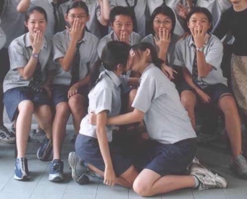 Young Japanese Schoolgirls Kissing